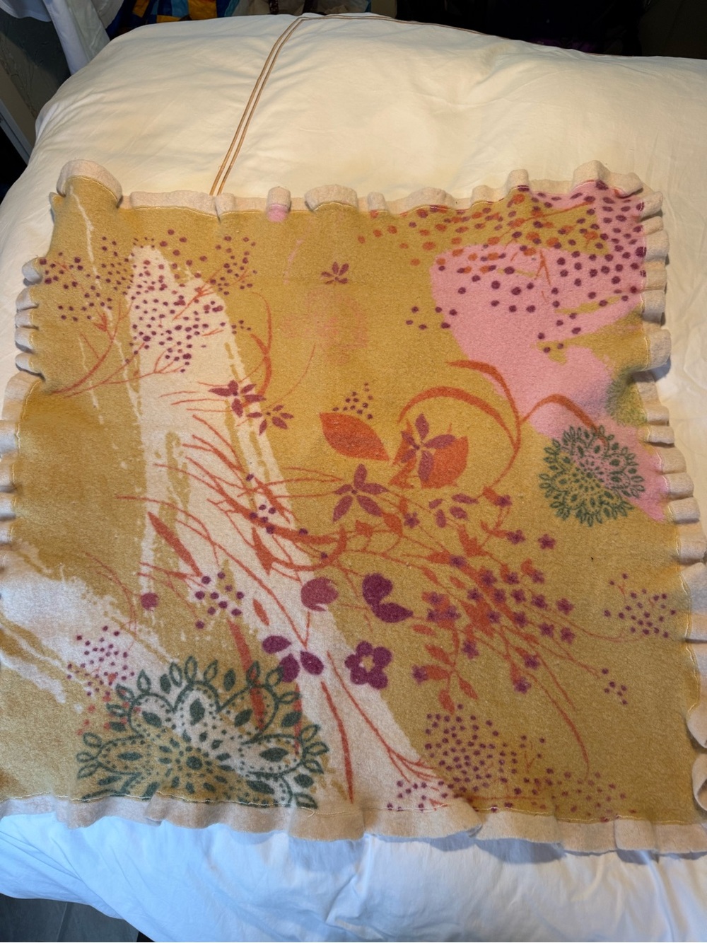 36x36 wool throw with soft colors by Moth